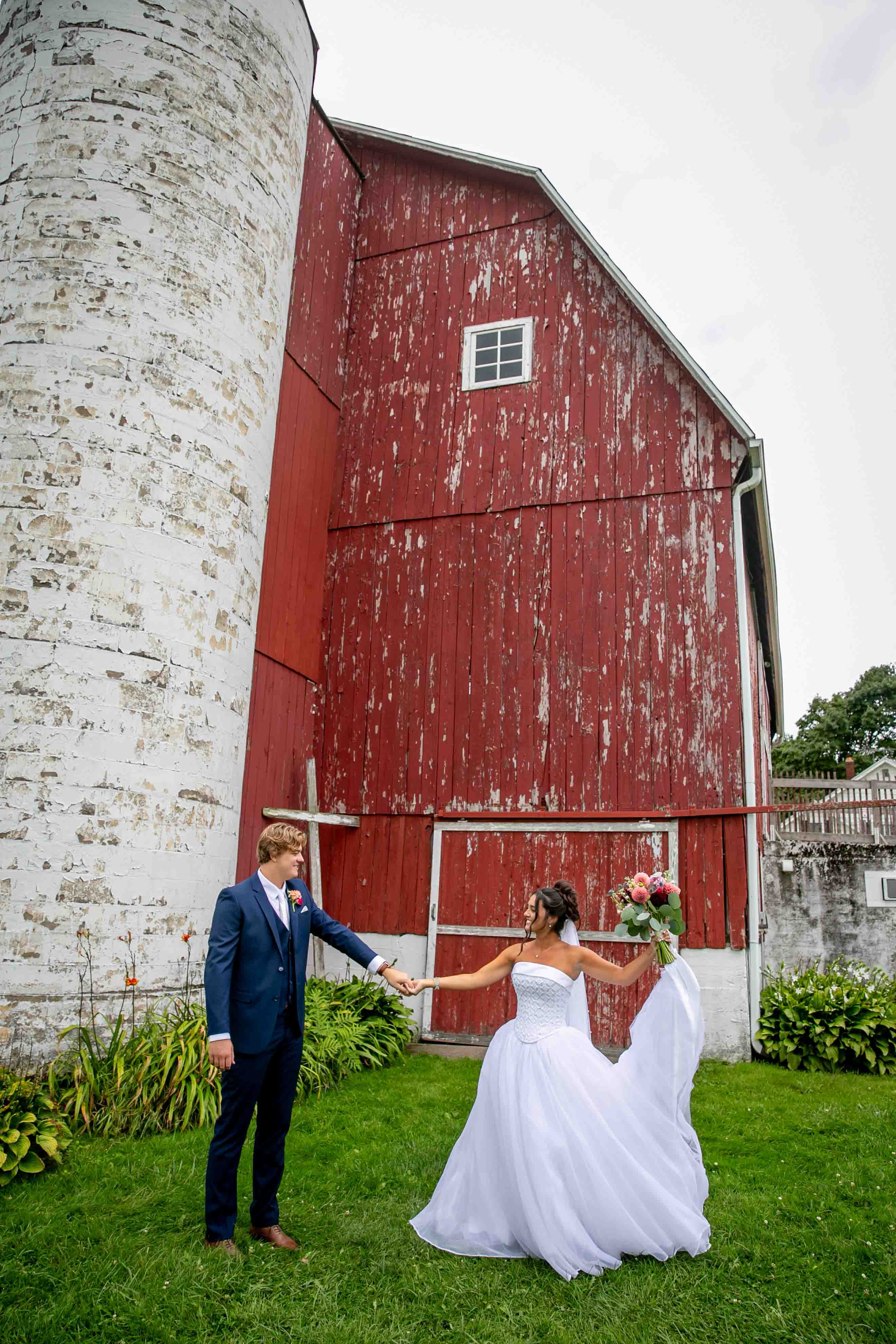 Bride and Groom by The Little Red Barn of Nunica